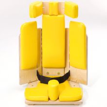 Corner Chair front view with yellow cushions and pelvic belt